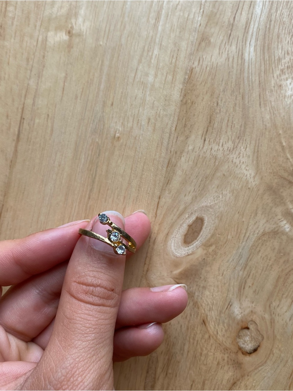 Brass gold colored ring with three crystal like gems
